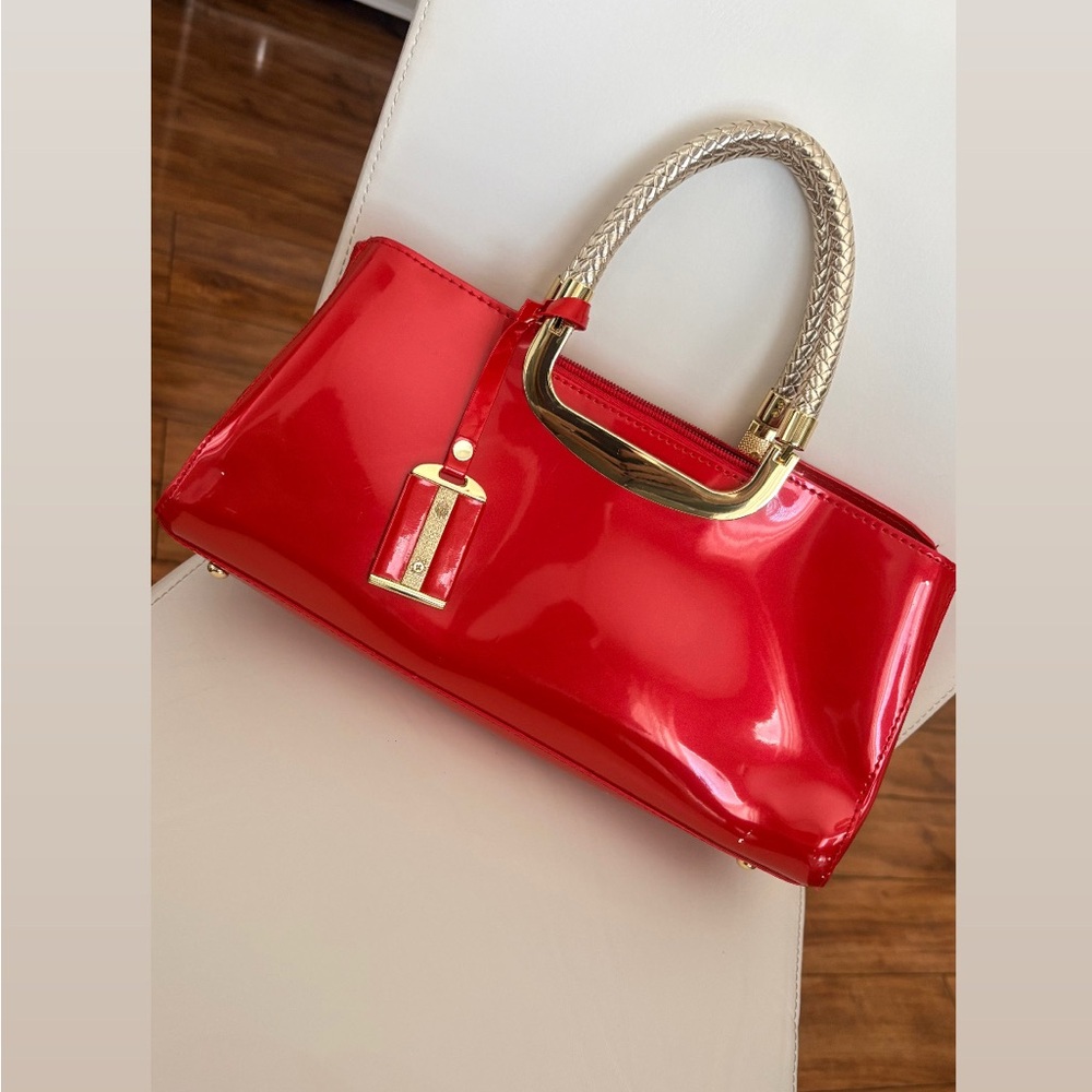 Chic Red Patent Leather Clutch with Gold Accents